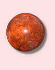 Pretty Carnelian Sphere With Baby Pink Patch