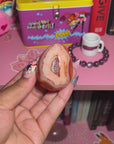 Pink Carnelian Egg With Druzy Cave